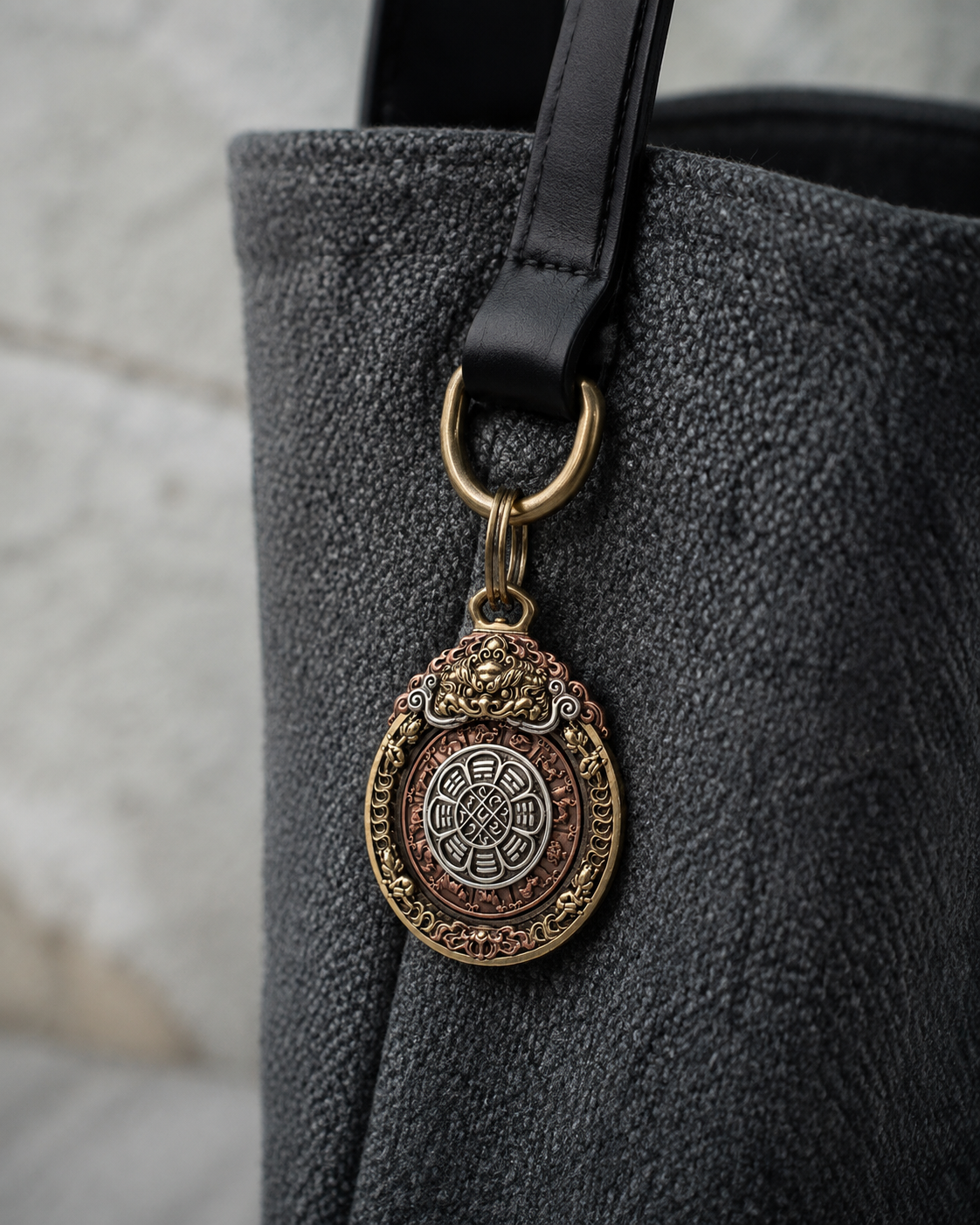 JIU GONG pendant with metal key ring styled as a contemporary bag charm