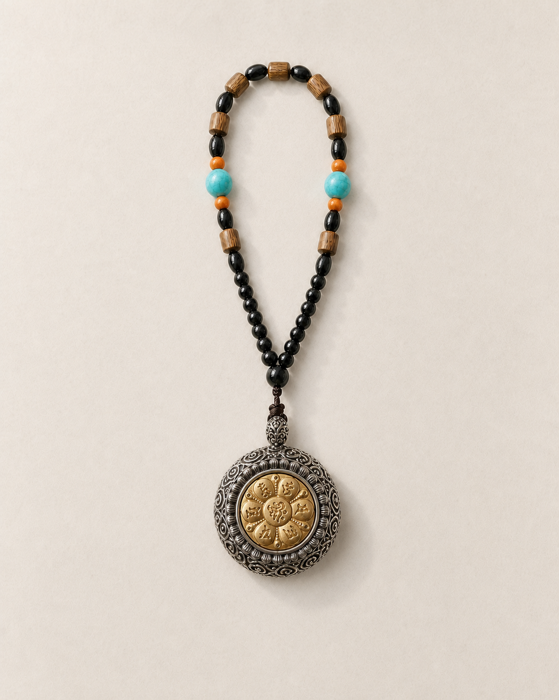 Reverse side of the Shan Gui lightning-struck jujube wood handheld rotating talisman with metalwork